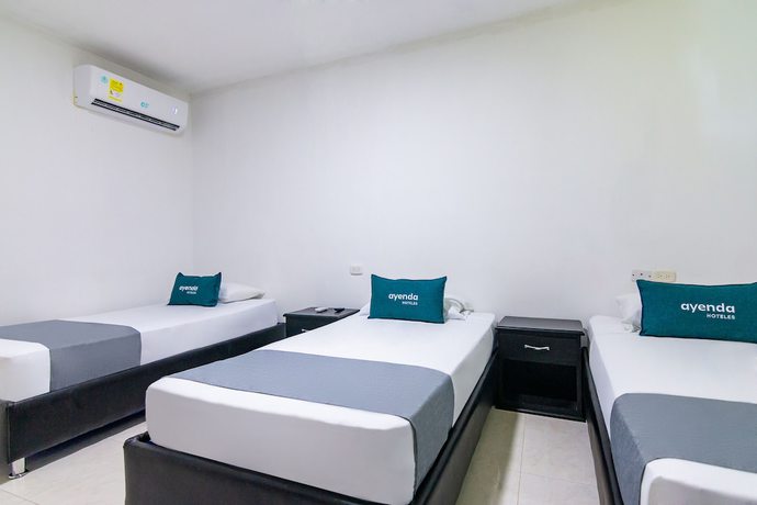 Imagen de la habitación del Hotel Ayenda Caribe Confort. Foto 4