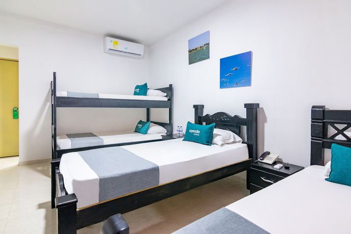 Imagen de la habitación del Hotel Ayenda Caribe Confort. Foto 6