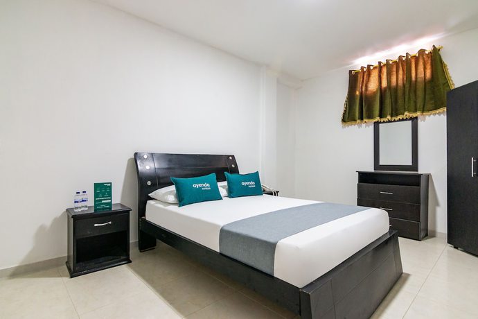 Imagen de la habitación del Hotel Ayenda Caribe Confort. Foto 7