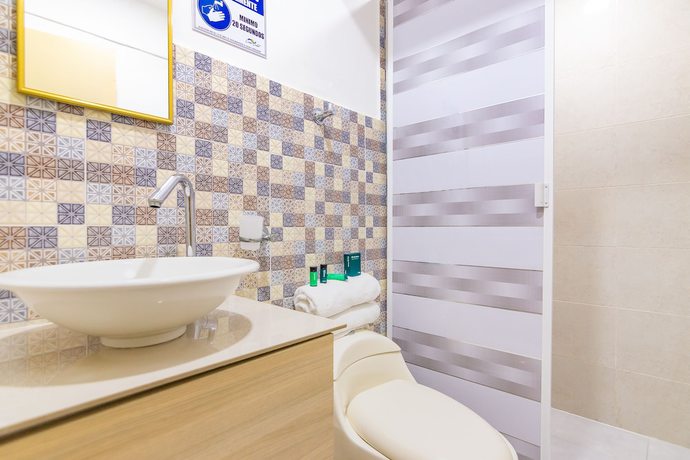 Imagen de la habitación del Hotel Ayenda Caribe Confort. Foto 8