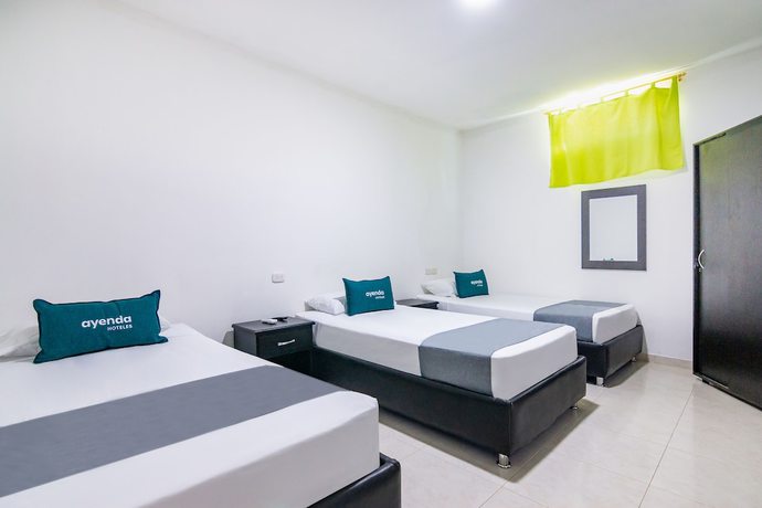 Imagen de la habitación del Hotel Ayenda Caribe Confort. Foto 9