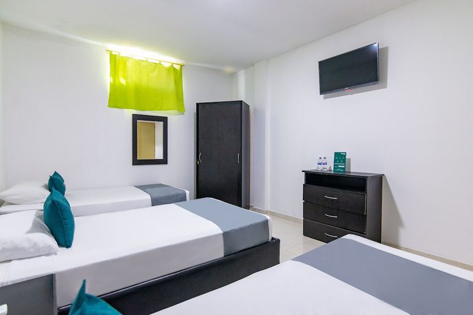 Imagen de la habitación del Hotel Ayenda Caribe Confort. Foto 10