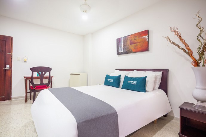 Imagen de la habitación del Hotel Ayenda Carivdi. Foto 13