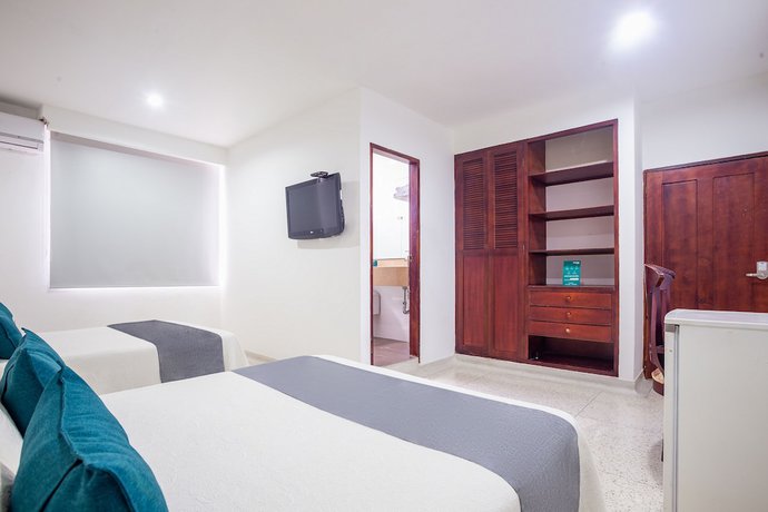 Imagen de la habitación del Hotel Ayenda Carivdi. Foto 19