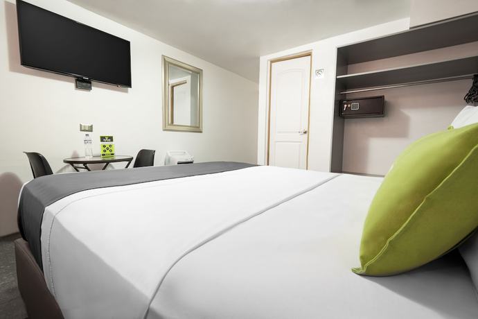Imagen de la habitación del Hotel Ayenda Casa Aika. Foto 13