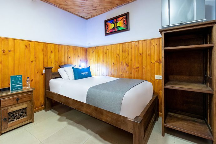 Imagen de la habitación del Hotel Ayenda Casa Candilejas. Foto 11