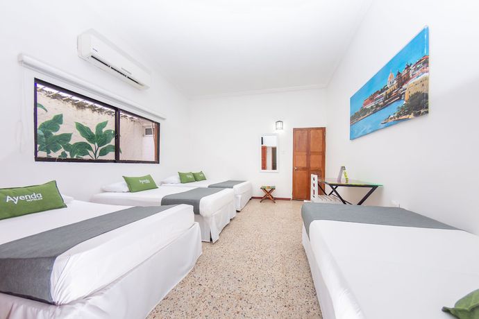 Imagen de la habitación del Hotel Ayenda Casa Cano 1805. Foto 13