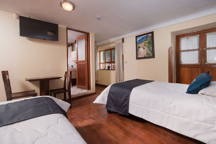 Imagen de la habitación del Hotel Ayenda Casa Escondida San Cristobal Premium. Foto 5