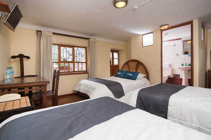 Imagen de la habitación del Hotel Ayenda Casa Escondida San Cristobal Premium. Foto 13