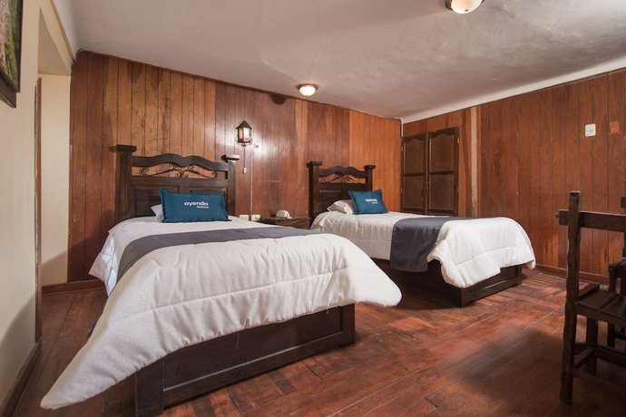 Imagen de la habitación del Hotel Ayenda Casa Escondida San Cristobal Premium, Santiago. Foto 6