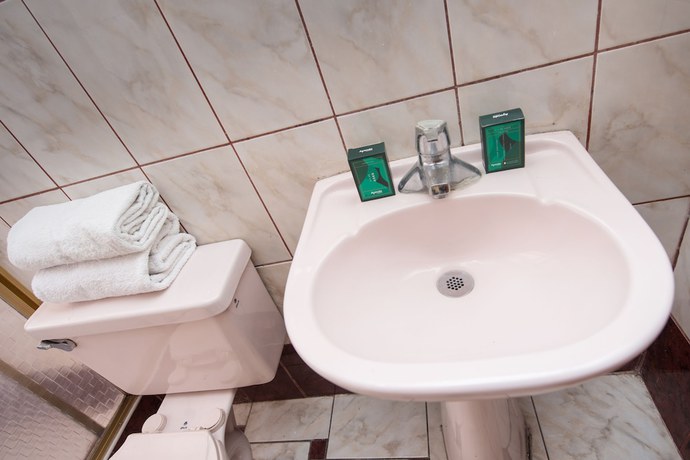 Imagen de la habitación del Hotel Ayenda Casa Escondida San Cristobal Premium, Santiago. Foto 9