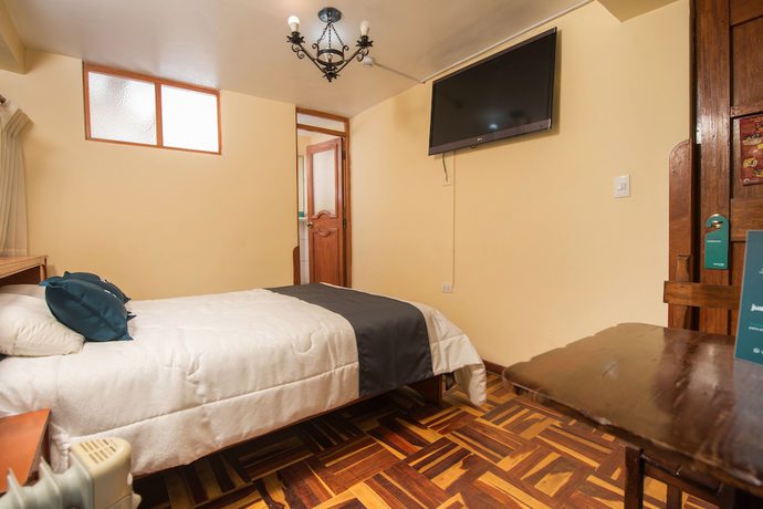 Imagen de la habitación del Hotel Ayenda Casa Escondida San Cristobal Premium, Santiago. Foto 10