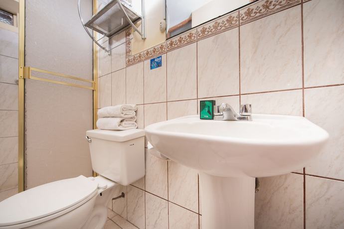 Imagen de la habitación del Hotel Ayenda Casa Escondida San Cristobal Premium, Santiago. Foto 14