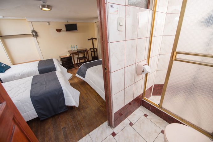 Imagen de la habitación del Hotel Ayenda Casa Escondida San Cristobal Premium, Santiago. Foto 15