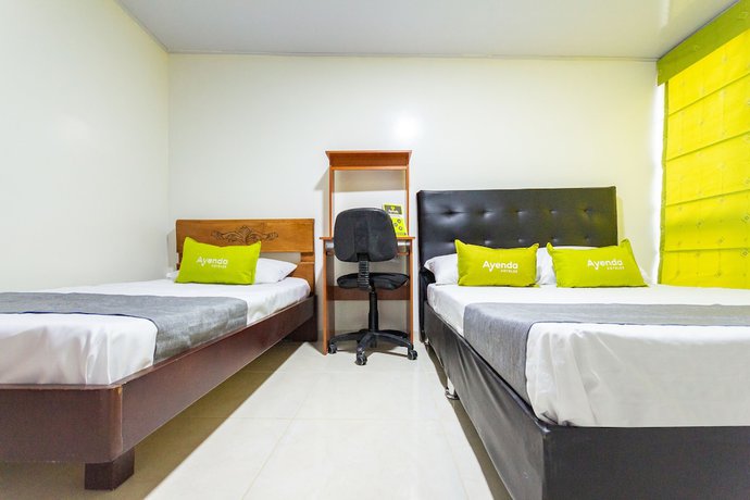 Imagen de la habitación del Hotel Ayenda Casa Howard 1092. Foto 12