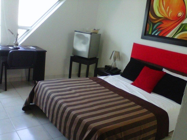 Imagen de la habitación del Hotel Ayenda Casa Real. Foto 11