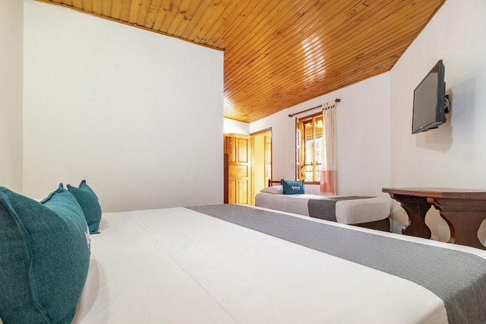 Imagen de la habitación del Hotel Ayenda Casona Santa Rosa. Foto 10