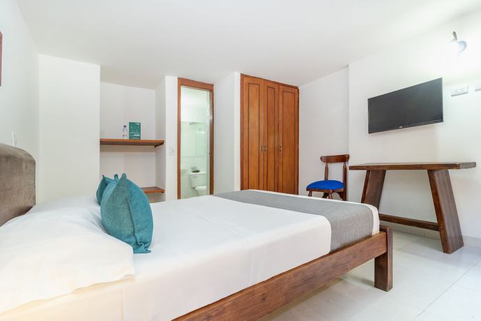 Imagen de la habitación del Hotel Ayenda Casona Santa Rosa. Foto 11