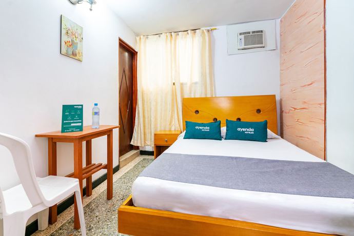 Imagen de la habitación del Hotel Ayenda Cavalier Suites. Foto 9