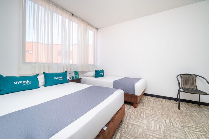 Imagen de la habitación del Hotel Ayenda Cielos Abiertos. Foto 12