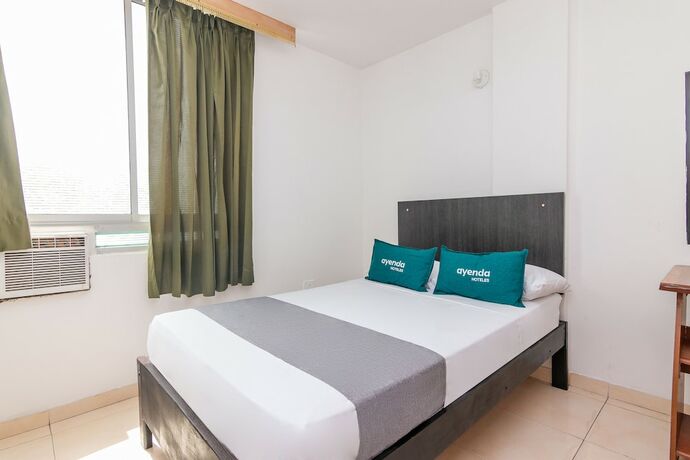 Imagen de la habitación del Hotel Ayenda Confort de la Guajira. Foto 12