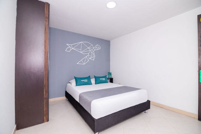 Imagen de la habitación del Hotel Ayenda DAM. Foto 3