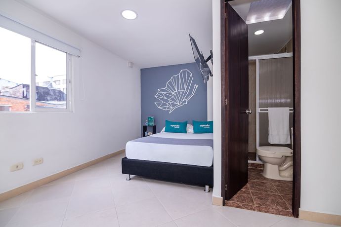 Imagen de la habitación del Hotel Ayenda DAM. Foto 13