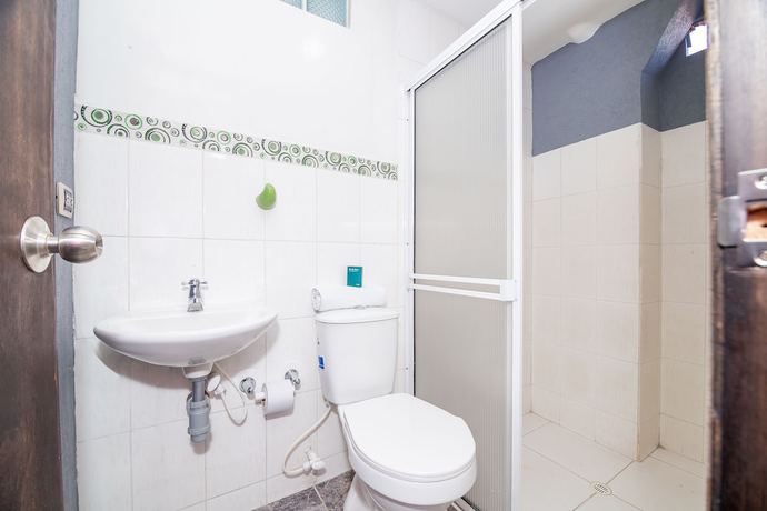 Imagen de la habitación del Hotel Ayenda DAM. Foto 17
