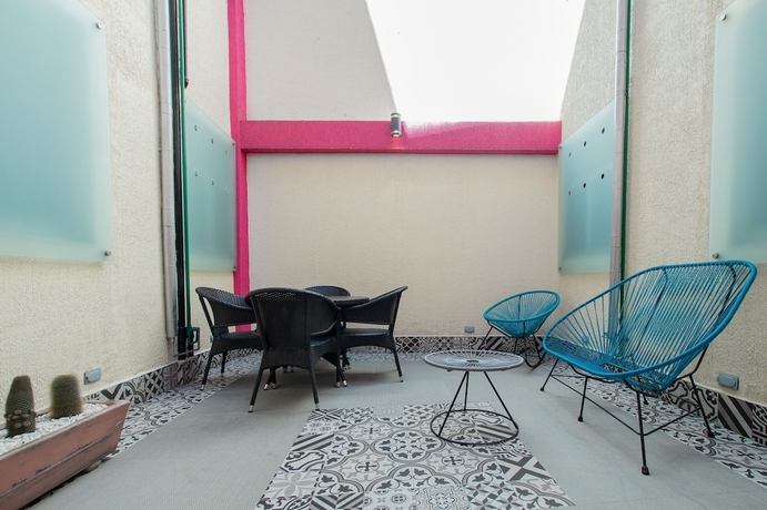 Imagen de la habitación del Hotel Ayenda Frida Costa Azul. Foto 10