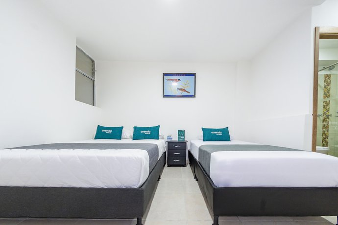 Imagen de la habitación del Hotel Ayenda Fundadores 1906. Foto 11