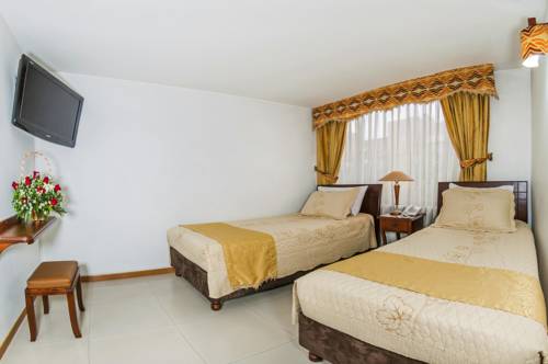 Imagen de la habitación del Hotel Ayenda Gran Marquez 1014. Foto 1