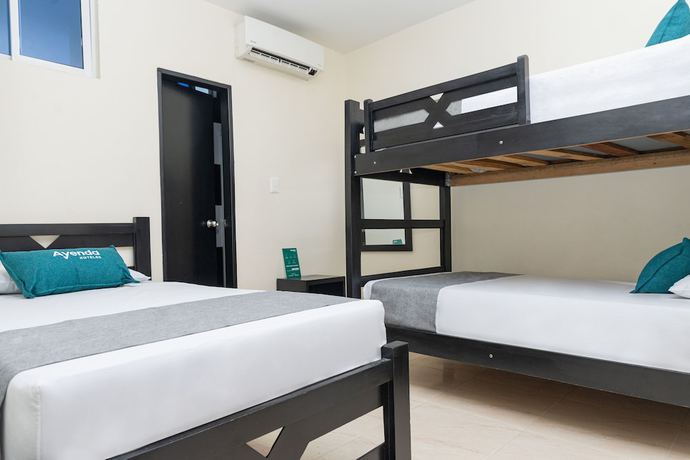 Imagen de la habitación del Hotel Ayenda Itaka. Foto 5