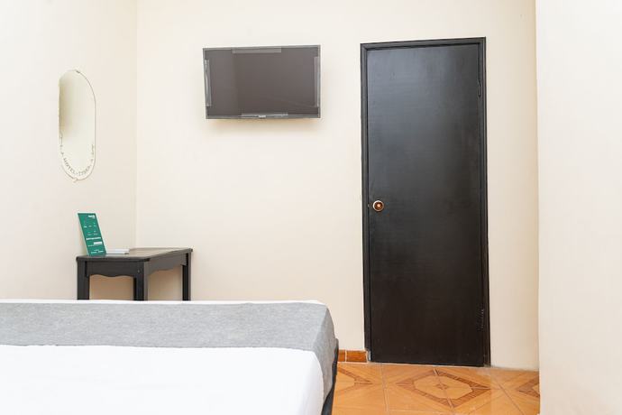 Imagen de la habitación del Hotel Ayenda Itaka. Foto 12