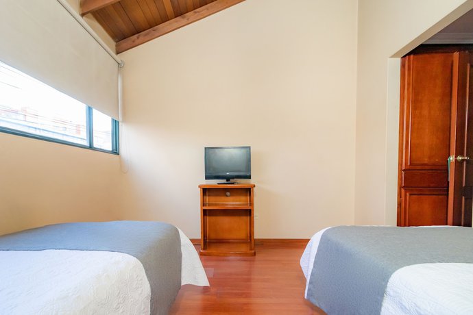 Imagen de la habitación del Hotel Ayenda La Antigua. Foto 17