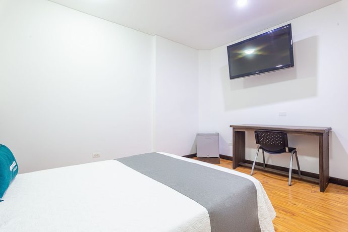 Imagen de la habitación del Hotel Ayenda Las 4 Estaciones. Foto 2