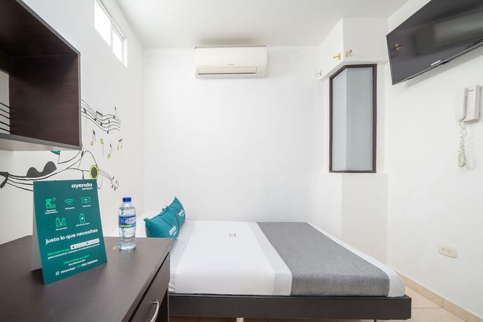 Imagen de la habitación del Hotel Ayenda Las Banderitas. Foto 17