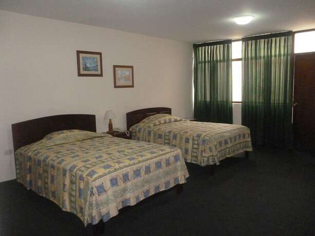 Imagen de la habitación del Hotel Ayenda Las Mercedes. Foto 17