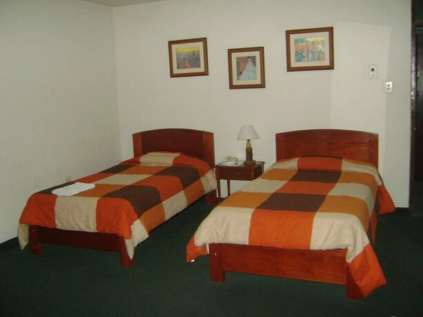 Imagen de la habitación del Hotel Ayenda Las Mercedes. Foto 18