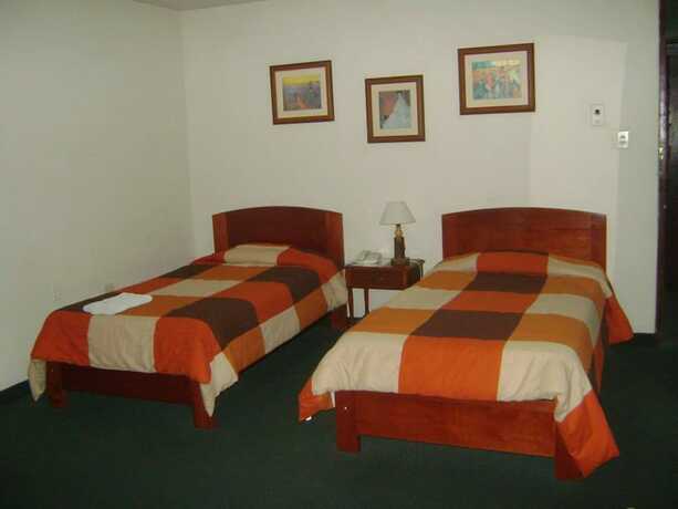 Imagen de la habitación del Hotel Ayenda Las Mercedes. Foto 20