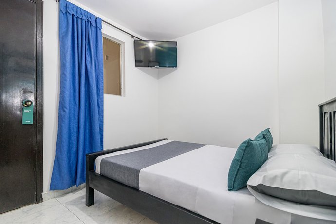 Imagen de la habitación del Hotel Ayenda Los Tres Pinos. Foto 6