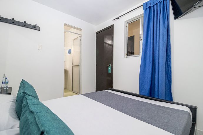 Imagen de la habitación del Hotel Ayenda Los Tres Pinos. Foto 7