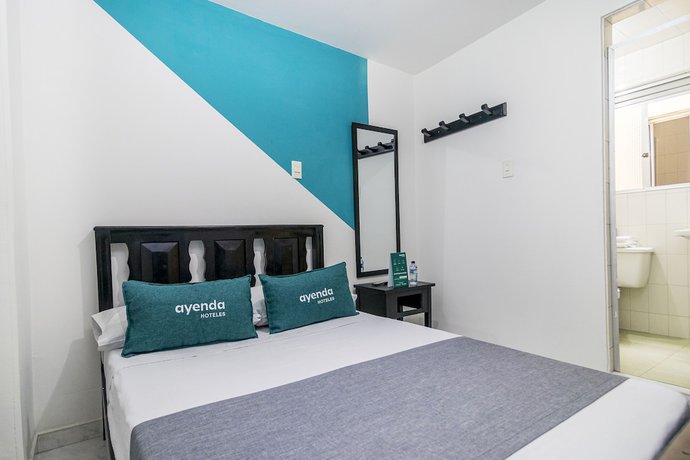 Imagen de la habitación del Hotel Ayenda Los Tres Pinos. Foto 8