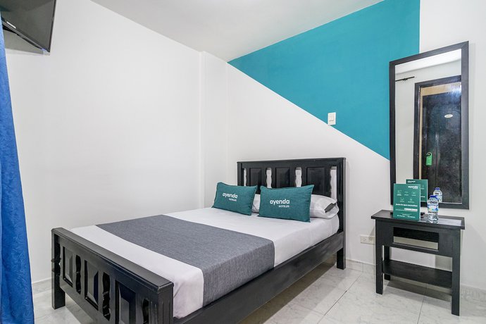 Imagen de la habitación del Hotel Ayenda Los Tres Pinos. Foto 10