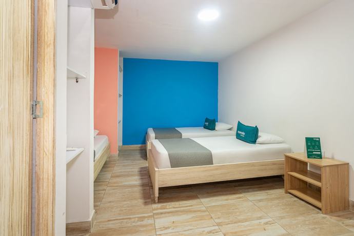 Imagen de la habitación del Hotel Ayenda Malaki. Foto 9