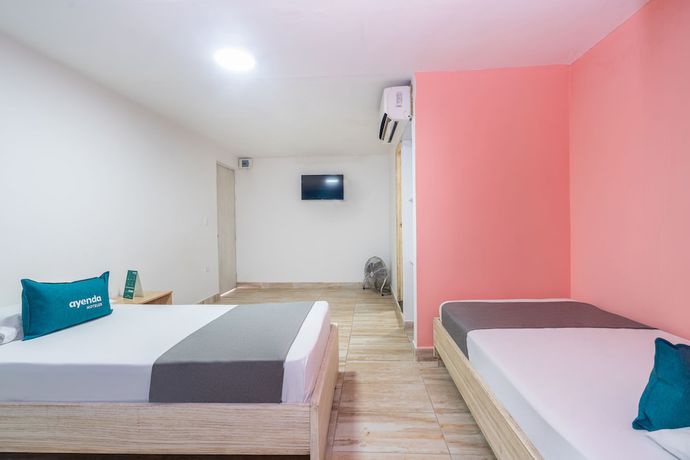 Imagen de la habitación del Hotel Ayenda Malaki. Foto 11
