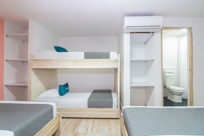 Imagen de la habitación del Hotel Ayenda Malaki. Foto 12
