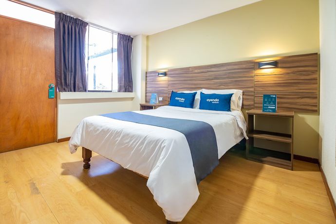 Imagen de la habitación del Hotel Ayenda Mosna. Foto 8