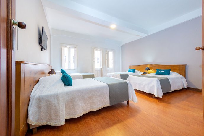 Imagen de la habitación del Hotel Ayenda Nuevo Escorial. Foto 7