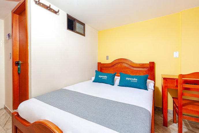 Imagen de la habitación del Hotel Ayenda Onix Suite. Foto 15