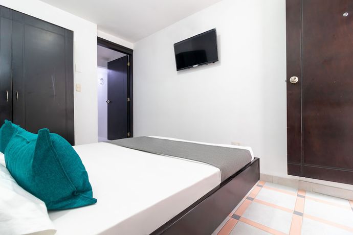 Imagen de la habitación del Hotel Ayenda Oporto Suites. Foto 15